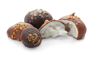 Tasty chocolate candies on white background