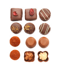 Tasty chocolate candies on white background, flat lay