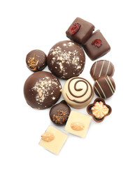 Tasty chocolate candies on white background