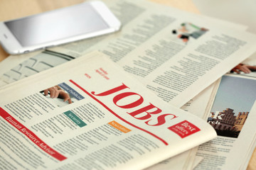 Morning newspapers on table, closeup