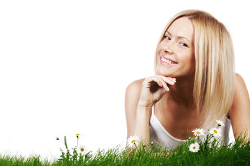 Woman on grass with flowers