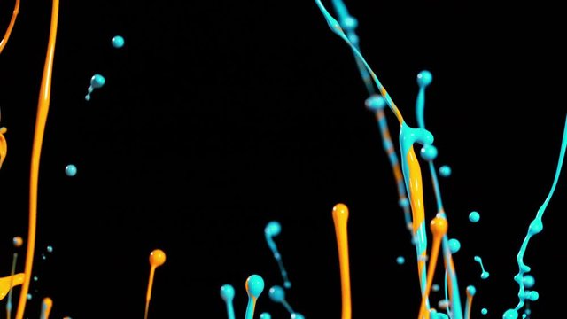 Colorful splashing paint in super slow motion. Shot with high speed cinema camera, 1000fps