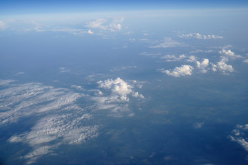 Fluffy clouds under the land