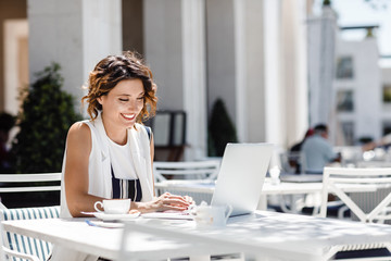 A Woman Freelancer Working at Coffee Shop