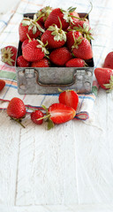 Strawberries in a box on a  table