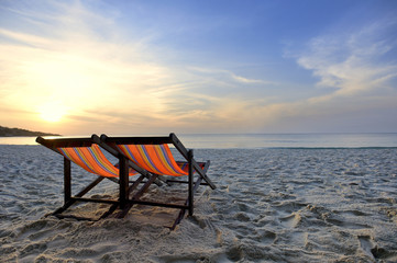 Fototapeta na wymiar Beach chair and the sea