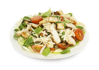 Healthy green organic Caesar salad with cheese, chicken, cherry tomatoes and croutons on white isolated background