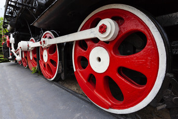 The locomotive-monument L-3291. Powerful, beautiful Russian locomotive. Wheels close-up. Steam engine