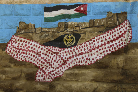Flag of Jordan, traditional keffiyeh or kefia and the Kerak Castle, a large crusader castle in Kerak (Al Karak) in Jordan