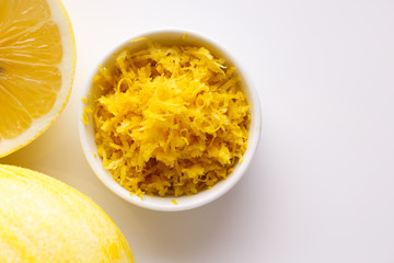 Lemon and juice on a white background