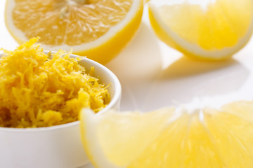 Lemon and juice on a white background