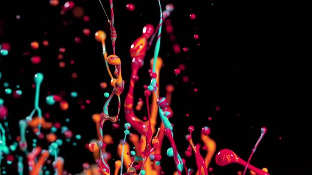 Colorful splashing paint in super slow motion. Shot with high speed cinema camera, 1000fps