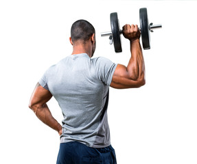 Strong handsome sport man making weightlifting on isolated white background