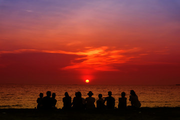 silhouette family look last light sunset sky on the beach