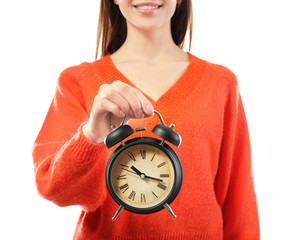 Woman with clock on white background. Time management concept