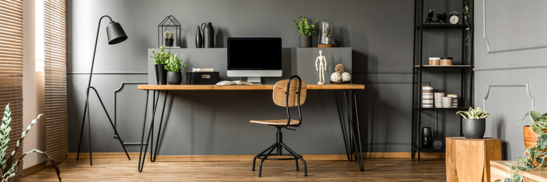 Open Space Living Room Interior With Mockup Computer, Fresh Plants And Decor Placed On Home Office Desk