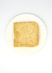 Slice bread on white dish and white background,soft focus.