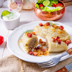 Rustic Cepelinai, a specialty Lithuanian and Polish cuisine.