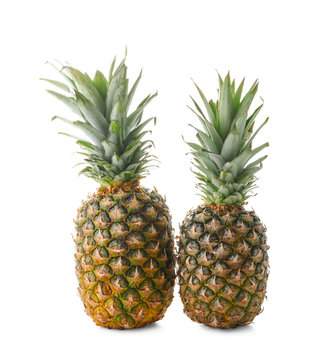 Delicious pineapples on white background © Pixel-Shot