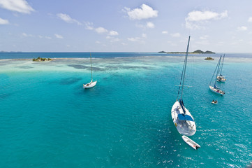 anchoring sailbooats in the shallow waters of Union Island,St.Vincent and Grenadines,West Indies