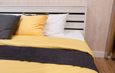 closeup Modern Bed , stylish bedroom interior design .