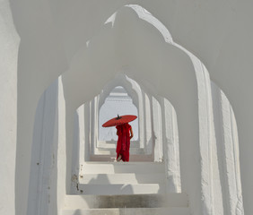 A Buddhist novice monk at white temple