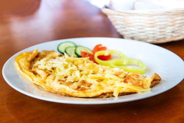 omelet with ham tomato and green salad