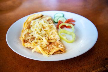 omelet with ham tomato and green salad