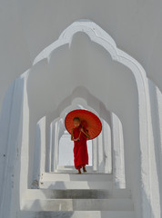 A Buddhist novice monk at white temple