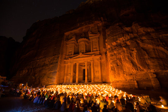 People With Stars And Candles At The Treasury Building In Petra Jordan