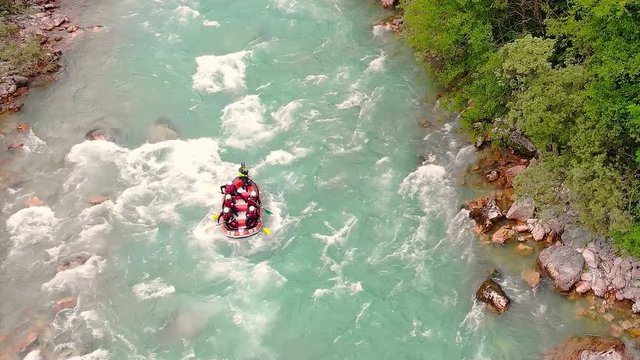 Aerial shot of people in boat whitewater rafting trip on Tara river in Montenegro