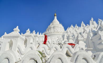 A Buddhist novice monk at white temple