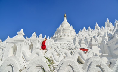 A Buddhist novice monk at white temple