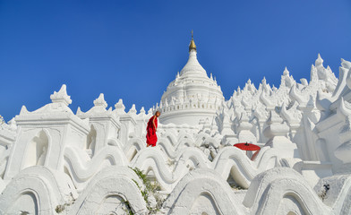 A Buddhist novice monk at white temple