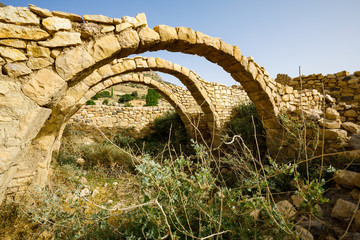 Three Stone Arches in Dana Village in Jordan