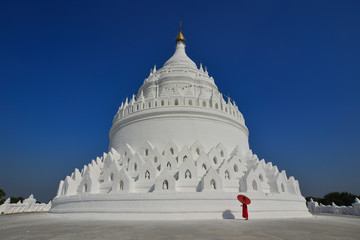 A Buddhist novice monk at white temple
