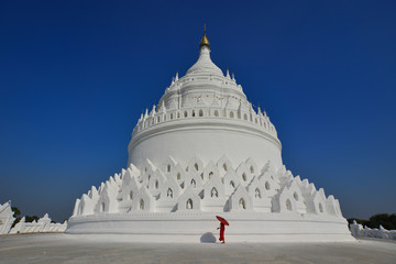 A Buddhist novice monk at white temple