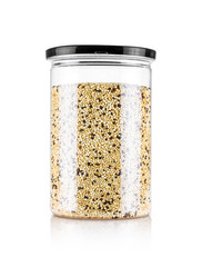 bottle of white quinoa seeds organic food