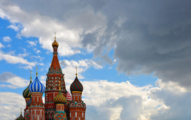 Fototapeta na wymiar St. Basil church and historical architecture with cloudy blue sky in Red Square Moscow, Russia