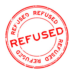 Grunge red refused word round rubber seal stamp on white background