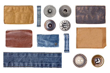 collection of various  jeans labels and buttons on white background. each one is shot separately.