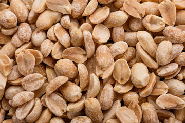 fresh peanuts on a wooden rustic background