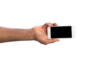 Hand holding mobile smartphone with blank screen