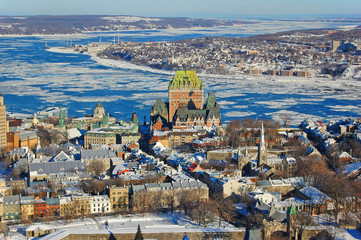 Fototapeta premium Quebec Lower City, St. Lawrence River in winter, Quebec, Canada. Historic District of Quebec City is UNESCO World Heritage Site since 1985.