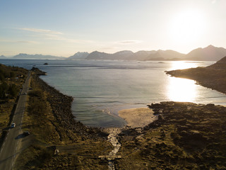 Aerial view over the Rorvikstranda beach and Gimsoystraumen fjord near Henningsvaer at Lofoten Islands / Norway