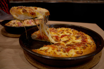 Double cheese Pizza on tray.