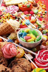 candies with jelly and sugar. colorful array of different childs sweets and treats