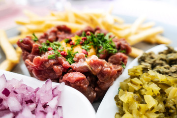 tasty Steak tartare (Raw beef) - classic steak tartare on white plate