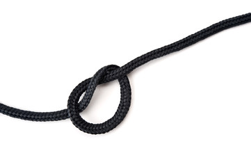 Knot on shoelace. Isolated on white background.