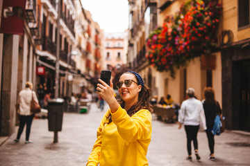 Woman touring the center of Madrid, tourism concept. - 208789677